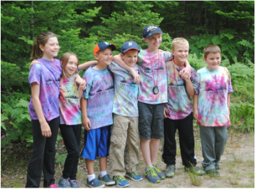 A group of summer campers smiling