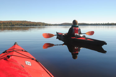 Kayaking where Grass River meets Clam Lake