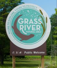 New directional signage at the entrance to Grass River